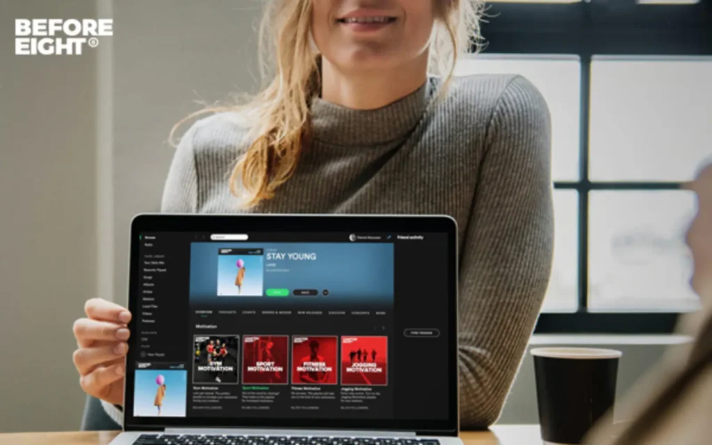 Woman using a Spotify Playlist Pitching Service